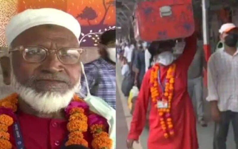 80 साल के बुजुर्ग कुली मुजीबुल्लाह मुफ्त में ढो रहे प्रवासी मजदूरों का सामान
